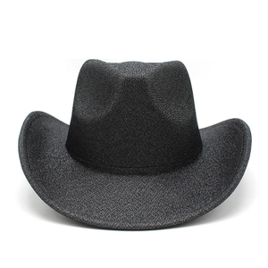 Detailed view of black cowboy hat with subtle shimmering texture and wide curved brim