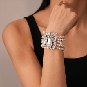 Macro shot of multi-layer pearl bracelet with large rectangle crystal centerpiece