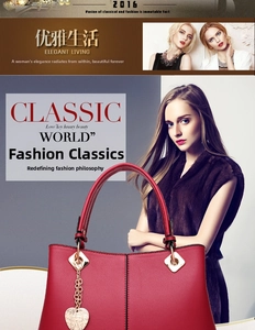 Detailed close-up of red leather tote bag with pebble grain texture and heart pendant