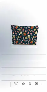 Detailed view of linen Christmas makeup bag with gingerbread man print and size specs