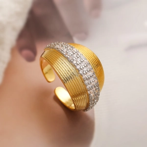 Gold plated geometric ring with grooved texture and center pave cubic zirconia inlay