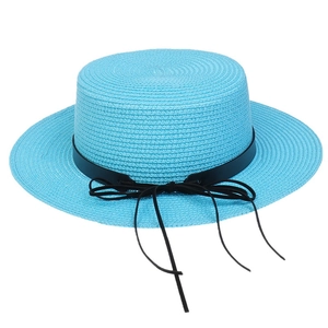 Detailed weave pattern of sky blue boater hat with a black ribbon bow detail
