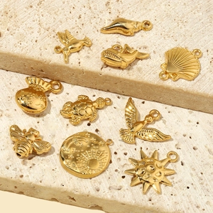 French style gold titanium steel charms set with shell, bird, and sun pendants
