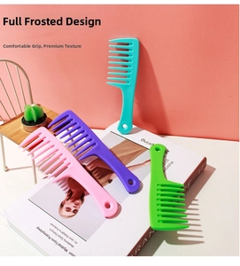 Macro view of wide-tooth hair combs in matte pastel colors for detangling hair