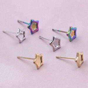 Star-shaped 304 stainless steel stud earrings in rainbow, silver, and gold finishes