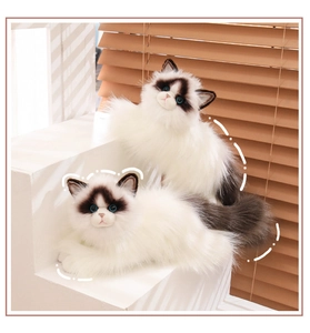 Realistic white plush ragdoll cats with blue eyes and dark grey points on wooden backdrop