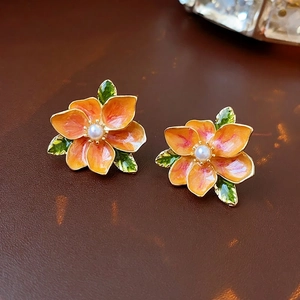 French vintage flower stud earrings with orange enamel petals and white pearls