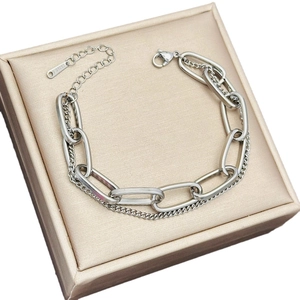 Silver double-layer stainless steel chain bracelet with lobster clasp in a jewelry box