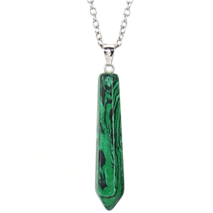 Macro detail of malachite hexagonal column pendant with silver metal cable chain