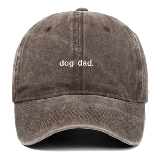 Close-up of dog dad white embroidery on washed cotton vintage coffee baseball cap