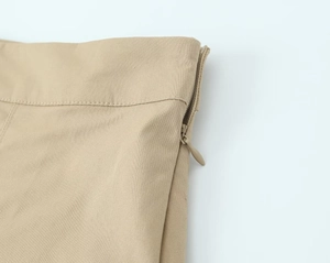 Detail of khaki twill cargo skort showing high-quality invisible zipper and neat stitching