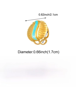 Detail view of gold ring with wavy texture and blue enamel inlay including measurements
