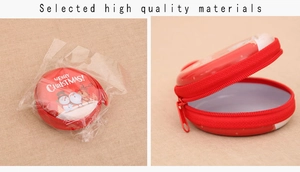 Detail of red circular Christmas coin purse with Santa and reindeer motifs in packaging