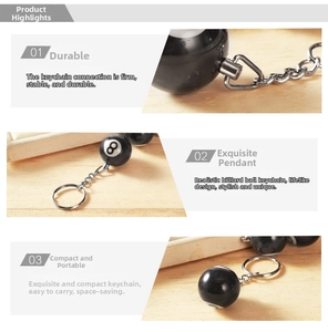 Detail view of durable number 8 billiard ball keychain with polished resin finish