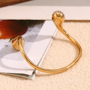 18K gold plated stainless steel teardrop bangle with micro-pave crystals for women