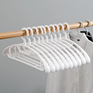 White retractable plastic children hangers set on wooden rod with anti-slip design