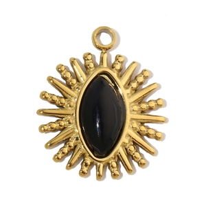 Detail showing vintage gold sunburst pendant with black oval onyx stone inlay