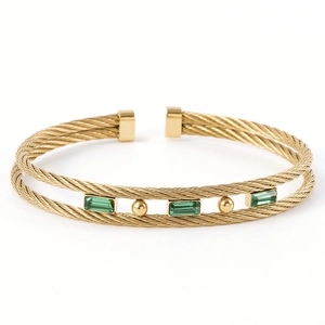 Double-layered steel cable cuff bracelet with green zircon stones in 18K gold plating