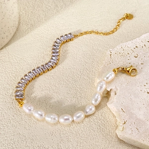 Detail of baroque pearl and rectangular zircon gold-plated bracelet with lobster clasp