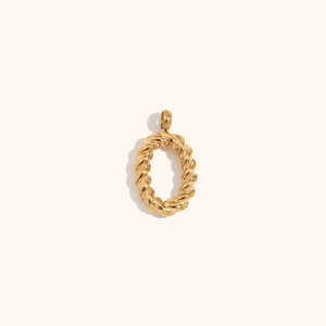 Macro detail of gold 18K plated twisted rope letter O pendant with metallic luster