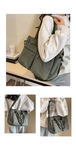 Detail view of large green corduroy crossbody bag with adjustable strap and pockets