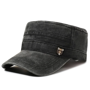 Vintage washed black flat top military cap with metal star badge and decorative stitching