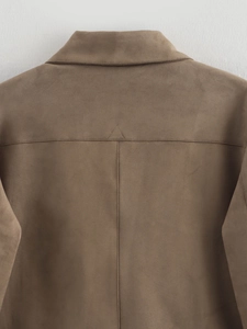 Close-up of back shoulder seams and texture on brown faux suede casual jacket