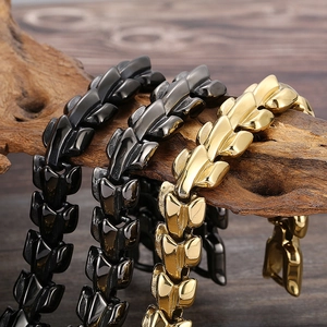 Men's dragon scale link chain bracelets in black, dark grey, and gold plating