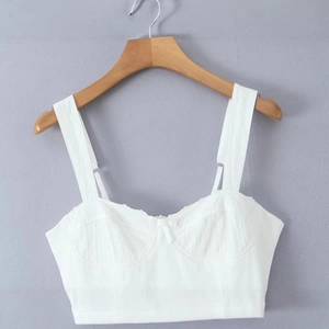 Sleeveless white slim-fit mesh dress with delicate lace trim and spaghetti straps