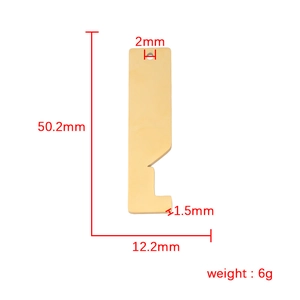 Polished gold house-shaped stainless steel pendant with specific size measurements