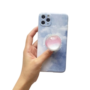 Blue cloud iPhone case with pink gradient pop socket and wanderer poem design