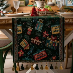 Close-up of green Christmas table runner with woven gift patterns and decorative tassels