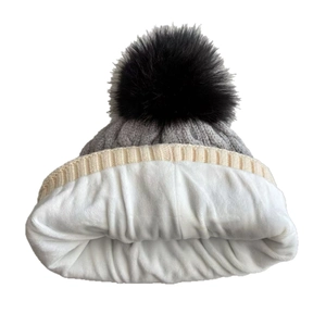Fleece lined grey diamond knit winter hat with black faux fur pom pom for kids