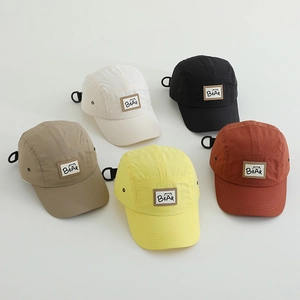 Detail of five-panel breathable mesh caps showing Bear patch and adjustable back straps