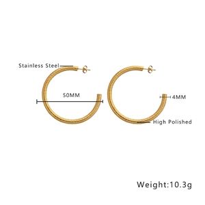 Detail view of 50mm gold stainless steel hoop earrings with high polished finish