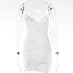 Back view of a white ruched mini dress with thin straps and a concealed zipper detail