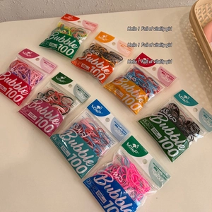 Multiple packs of MSMP elastic hair ties in vibrant candy colors for ponytails
