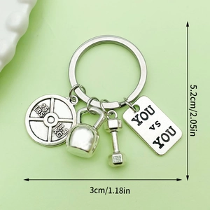 Silver fitness keychain featuring dumbbell, kettlebell, and 25lb weight plate charms