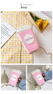 Detail of pink coffee cup cross-body bag with golden chain strap and coffee patch