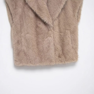 Women's dusty pink faux fur short vest featuring a stylish wide lapel and soft plush texture