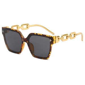 Chic oversized leopard print sunglasses with golden metal chain temples and grey lenses