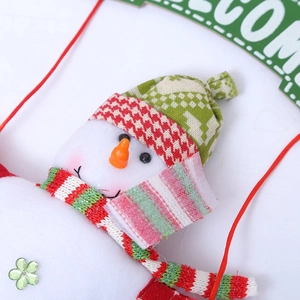 Christmas snowman plush ornament with red striped scarf and green Welcome sign