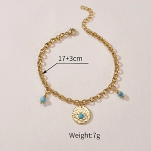 Detail of evil eye pendant bracelet with blue beads, 17+3cm length and 7g weight