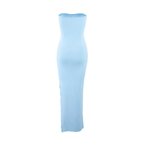 Close-up of side slit detail on a slim-fit light blue strapless bodycon maxi dress