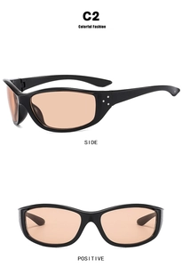 Macro side and front view of Y2K futuristic sunglasses with orange lenses and silver studs
