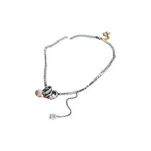 Silver paperclip necklace with interlocking circles and sparkling zircon heart pendant