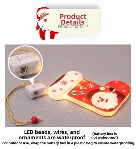 Suspension LED chaussette de Noël étanche avec motif Père Noël et boîtier de piles