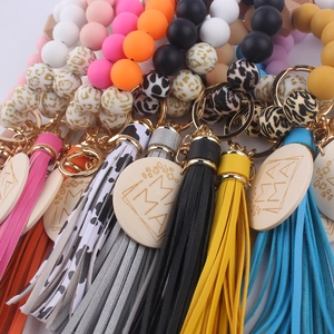 Floral silicone bead bracelet with MAMA wood charm, leopard print and tassel keychain