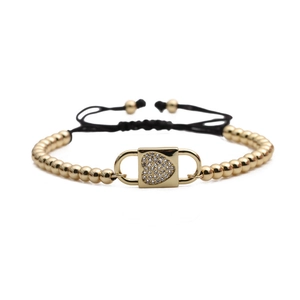 Verstellbares schwarzes Kordelarmband mit Goldperlen und Herz-Schloss-Anhänger mit Zirkon