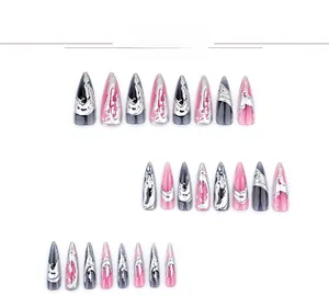 Detail of 24pcs long stiletto press-on nails with pink grey marble and 3D silver liquid metal